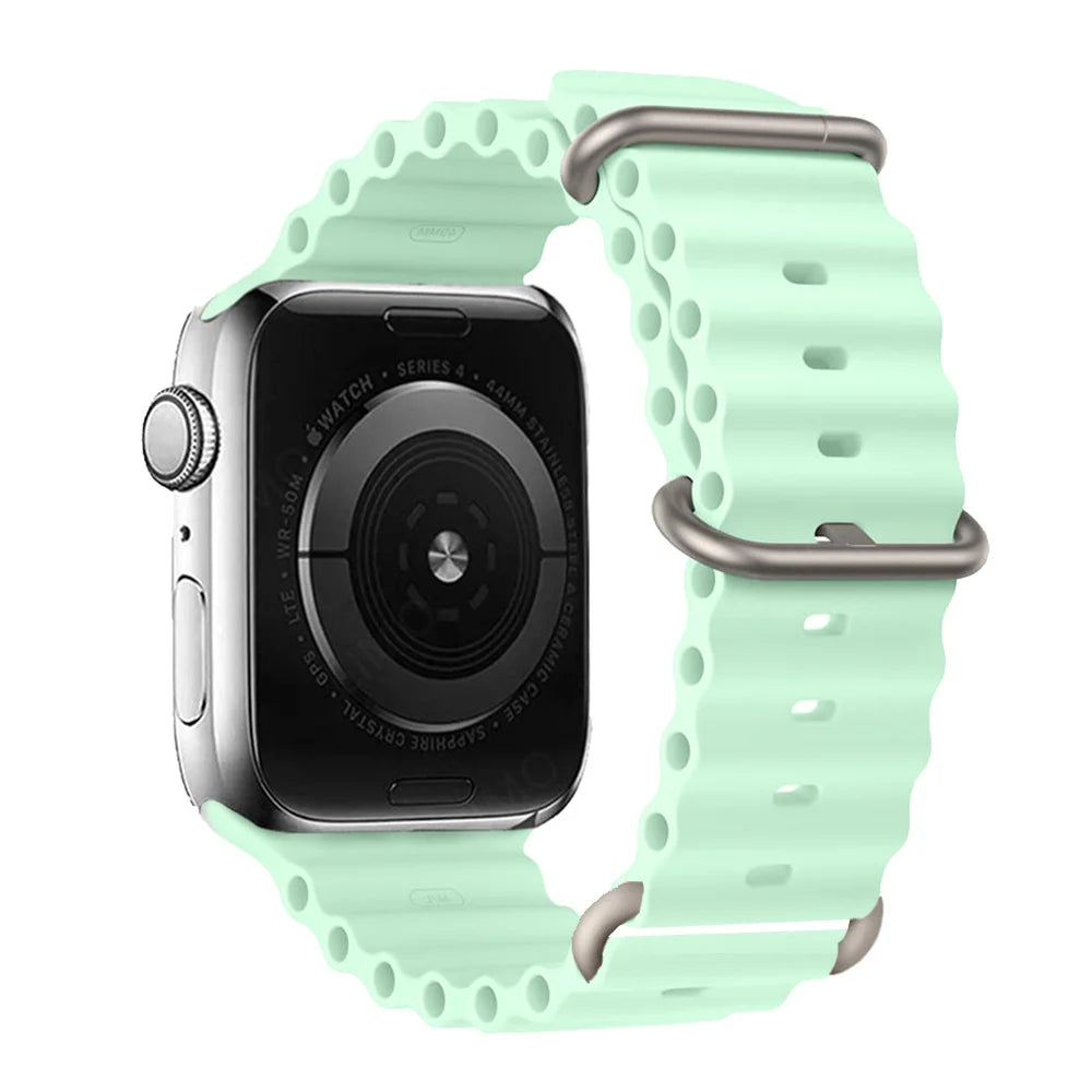Apple Watch with mint green silicone strap, waterproof and breathable design for active lifestyles.