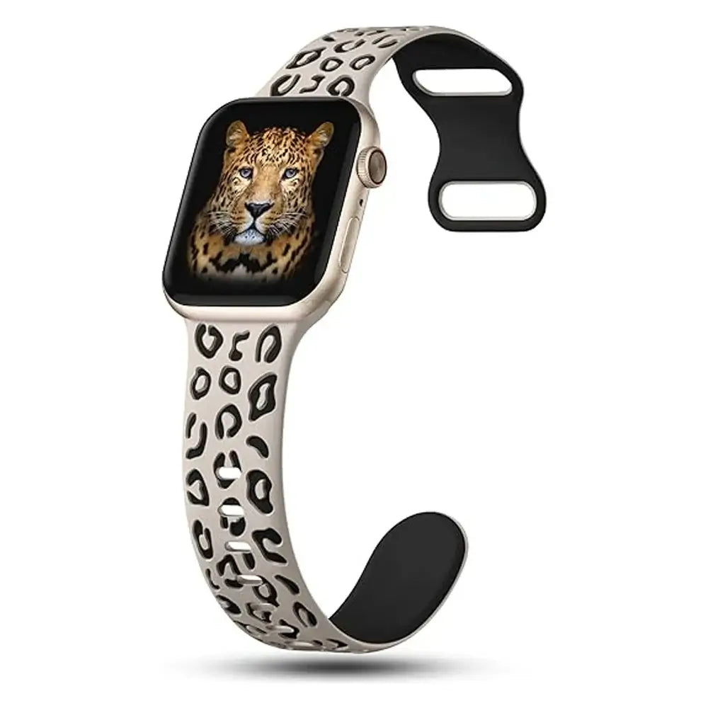Ivory and black leopard silicone Apple Watch strap shown open