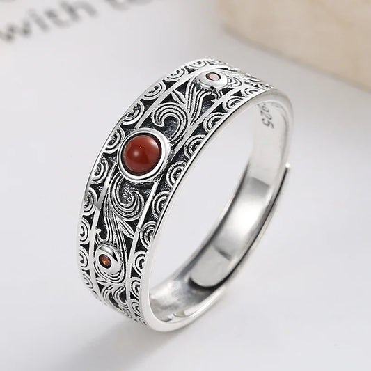 Carnelian band ring in patterned 925 sterling silver