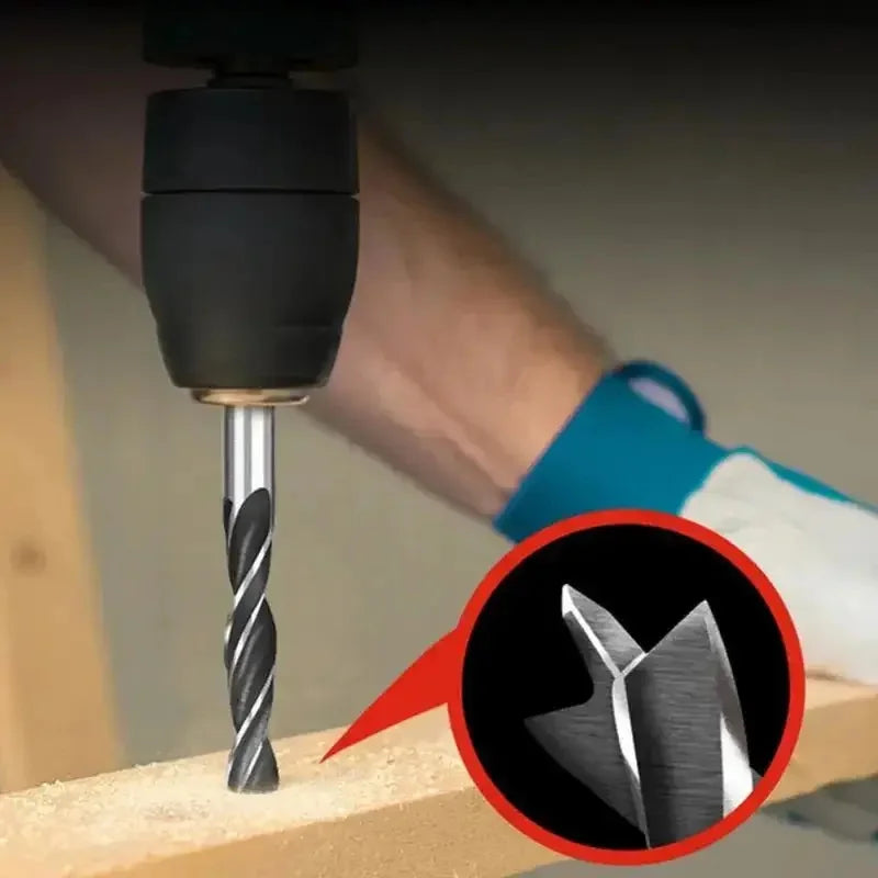 Brad point drill bit drilling into wood