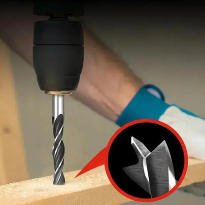 Brad point drill bit drilling into wood