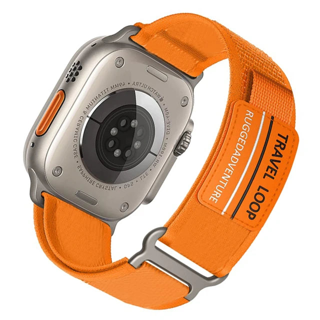 Apple Watch with vibrant orange Nylon band, Rugged Trail Loop, designed for durability and outdoor adventures.