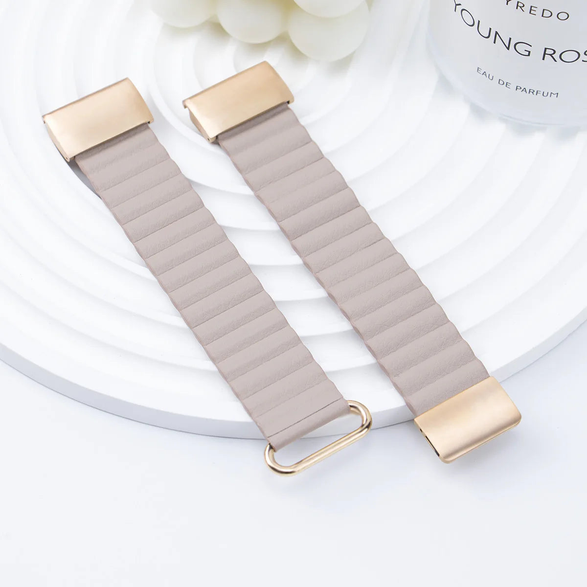Garmin replacement strap featuring a luxurious beige design with gold accents, ideal for smartwatches.