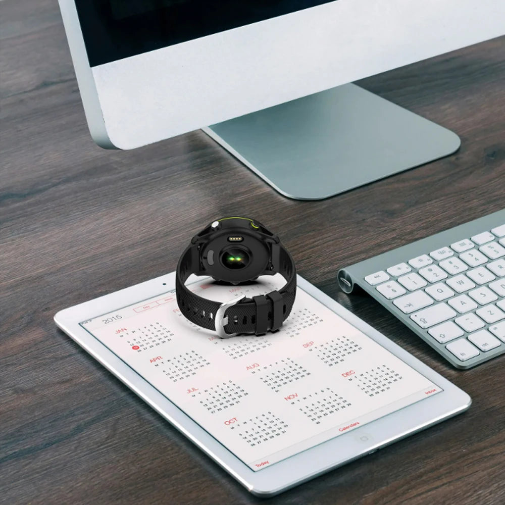 Black silicone watch band on desk for COROS – BandsCo Straps