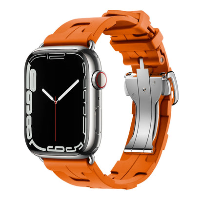 Apple Watch with an orange silicone band, featuring a soft, flexible, and waterproof design for comfort and durability.