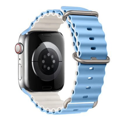 Apple Watch with a blue silicone strap, designed for comfort, waterproof and breathable for active lifestyles.