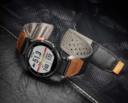 Garmin rugged nylon watch band strap on smartwatch, showcasing durable design for active lifestyles and versatile use.