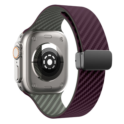 Apple Watch with purple silicone strap featuring a magnetic buckle and durable design for comfort and security.