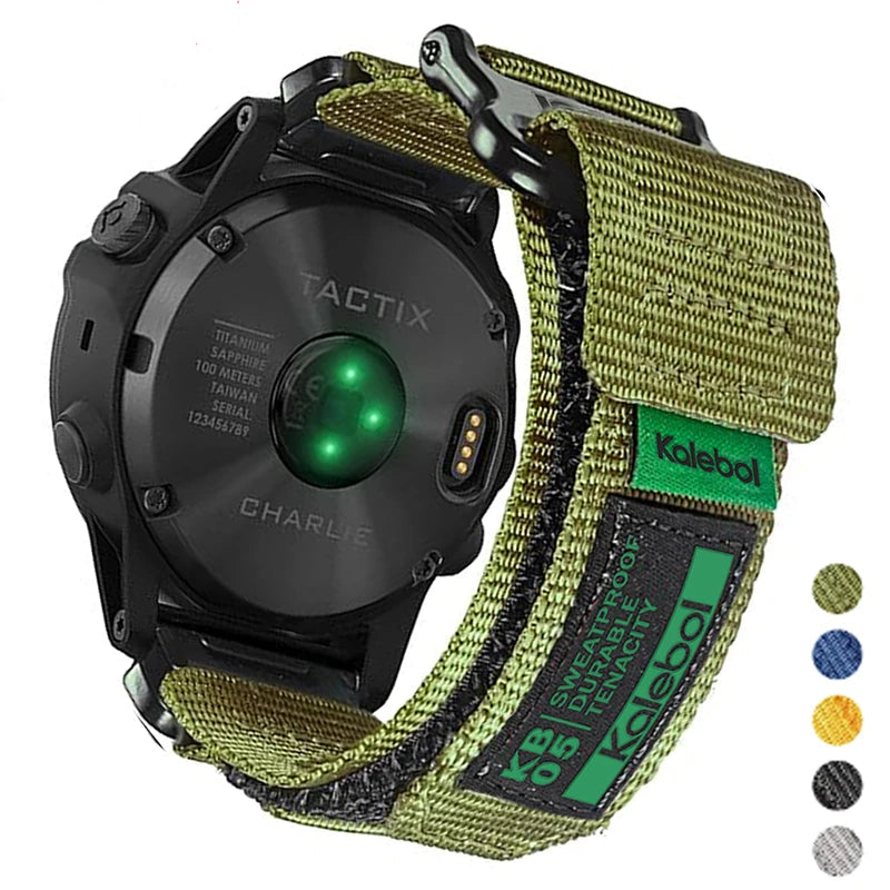 Garmin smartwatch with tactical nylon loop strap in green, showcasing breathable design for active lifestyles.
