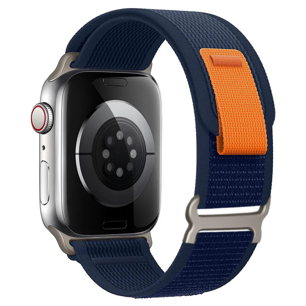 Apple Watch with Trail Loop Nylon Strap in navy and orange, designed for durability and comfort during activities.