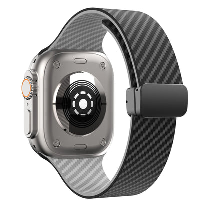 Apple Watch with a carbon fiber strap showcasing a sleek design and secure magnetic closure.