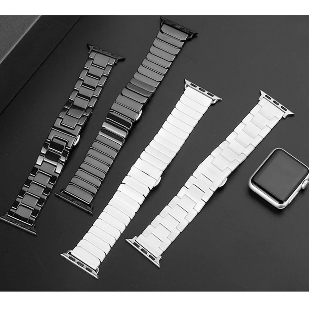Black and white ceramic bands showing two link designs for Apple Watch
