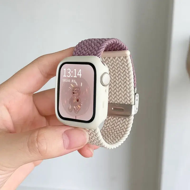 Mauve and beige woven Apple Watch band with white case
