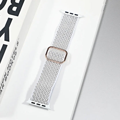 Apple Watch nylon sport loop strap in white, featuring a breathable design and gold buckle, perfect for style and comfort.