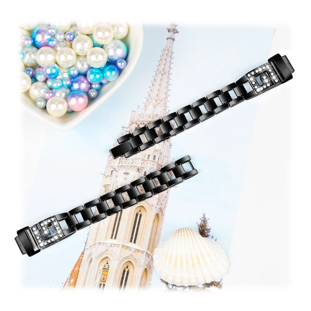 Fitbit Inspire 3 metal diamond band displayed on a colorful background with decorative pearls.