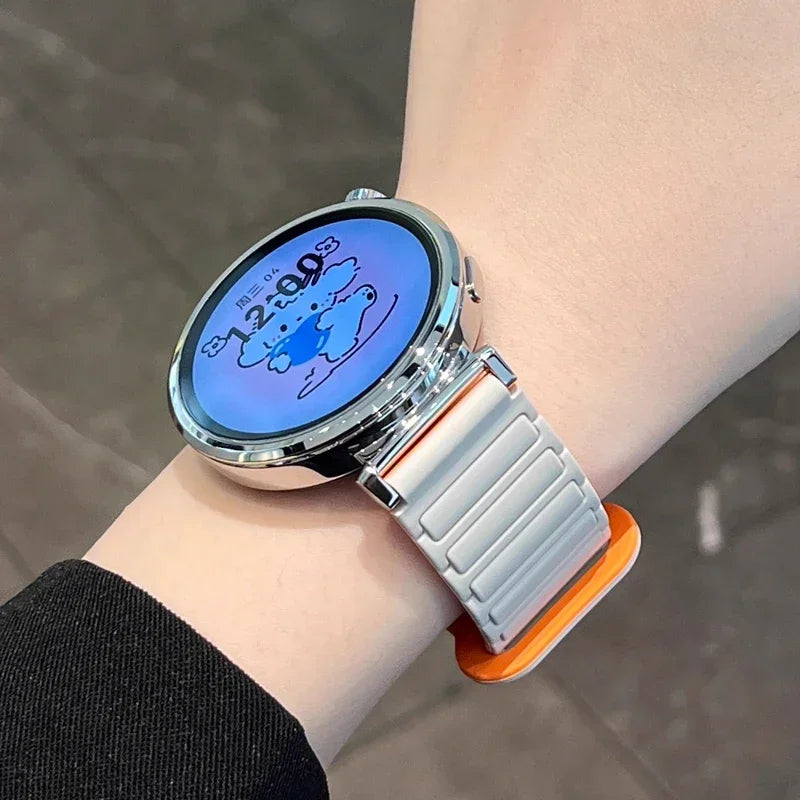Gray and orange silicone loop worn on wrist for COROS – BandsCo Straps