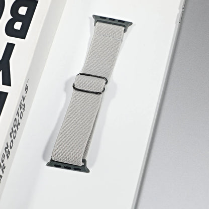 Apple Watch nylon sport loop strap in gray color, showcasing breathable fabric for comfort and style.