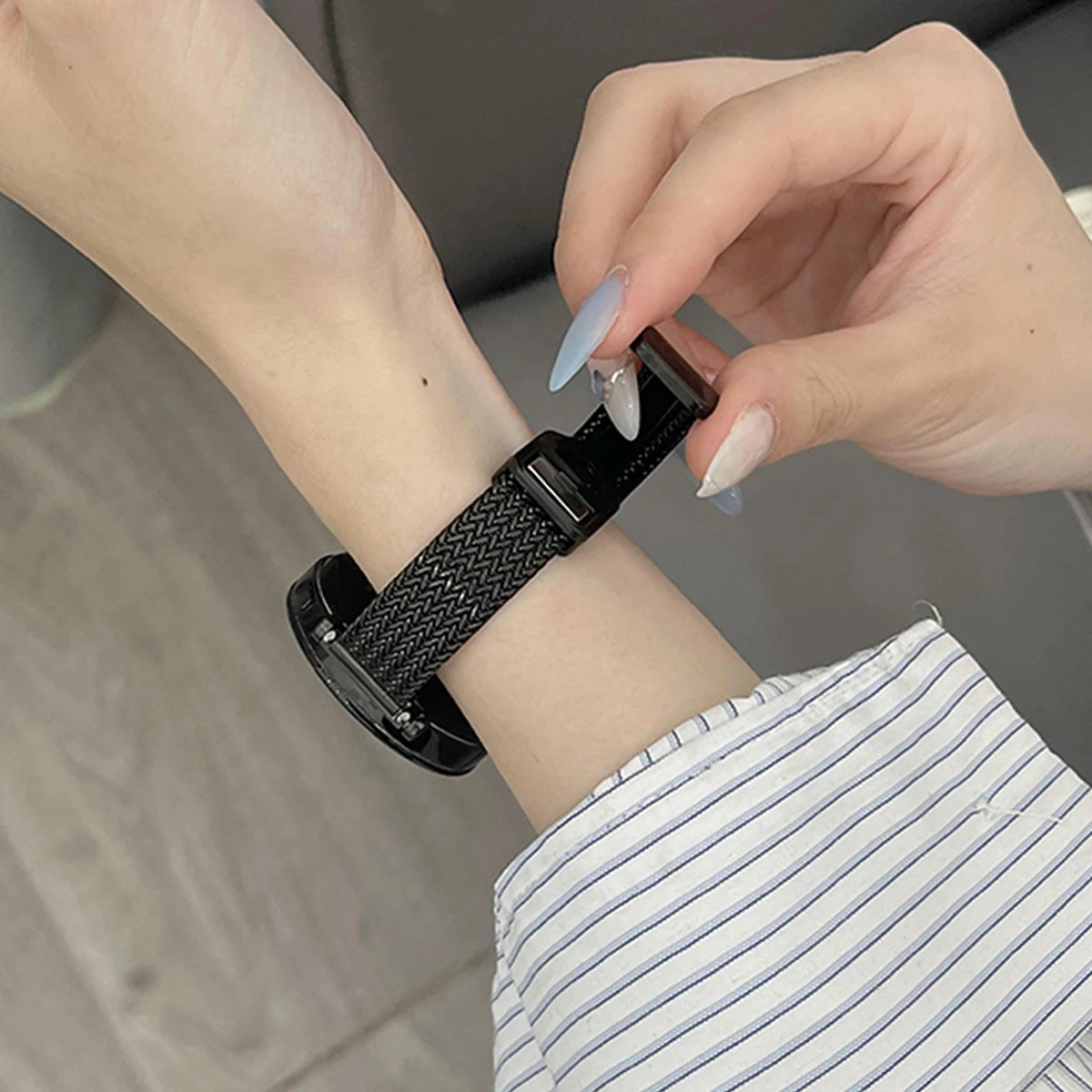 Slim Magnetic Metal Mesh Band in black worn on a wrist