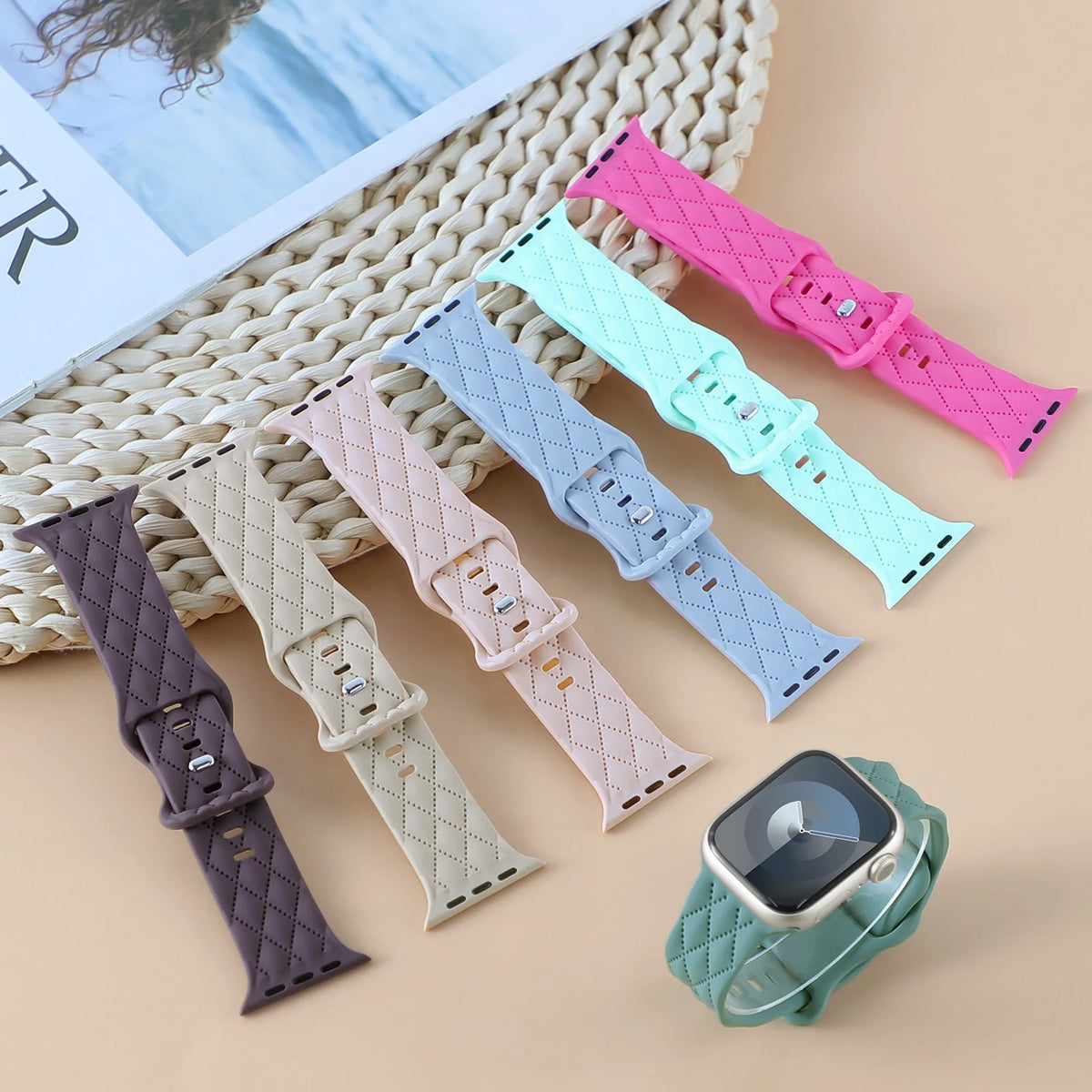 Quilted-pattern bands displayed in assorted colors for Apple Watch