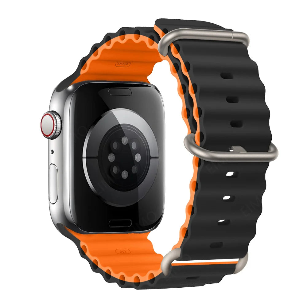 Apple Watch with black and orange silicone strap, waterproof and breathable design for active lifestyles.