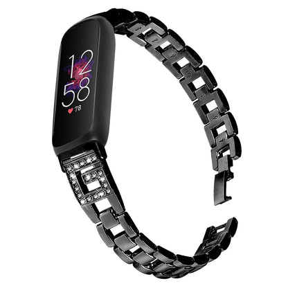 Fitbit Inspire 3 with a stylish metal diamond band, showcasing durability and elegance for smartwatch enthusiasts.