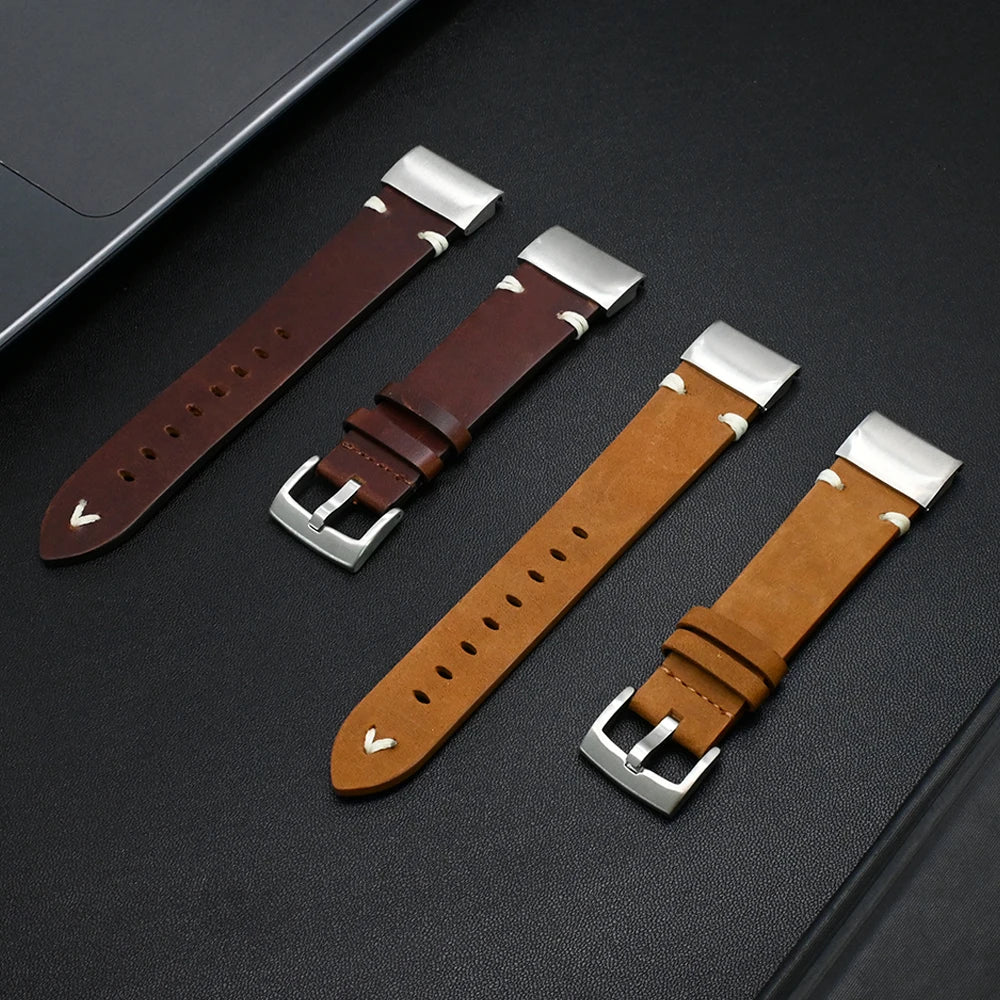 Various Garmin leather straps in brown and tan colors with silver buckles, showcasing premium comfort and style.