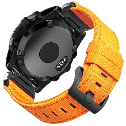 Garmin smartwatch with an orange rugged nylon sport band, featuring a secure G-hook closure for active lifestyles.
