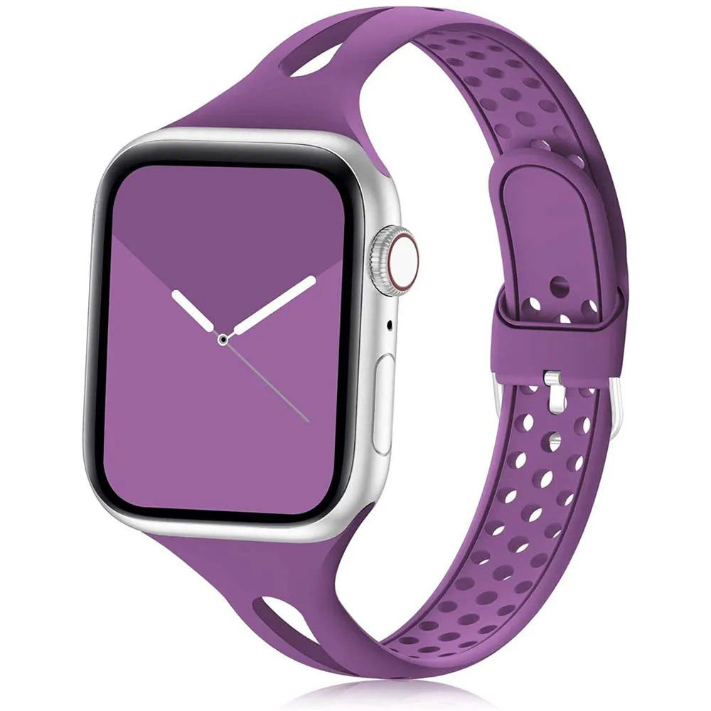 Apple Watch with purple silicone strap, soft and breathable design for comfort and style.