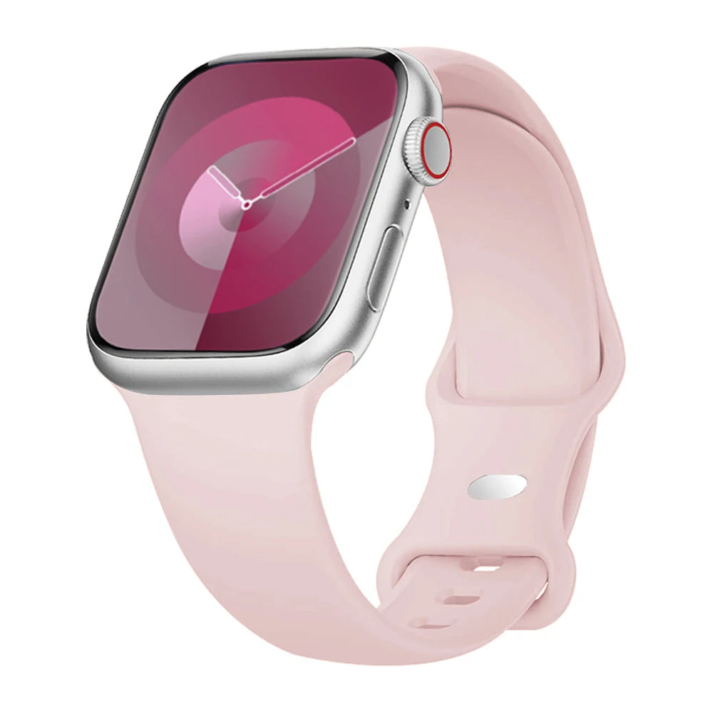 Apple Watch with soft pink silicone strap, showcasing a modern design for comfort and waterproof functionality.