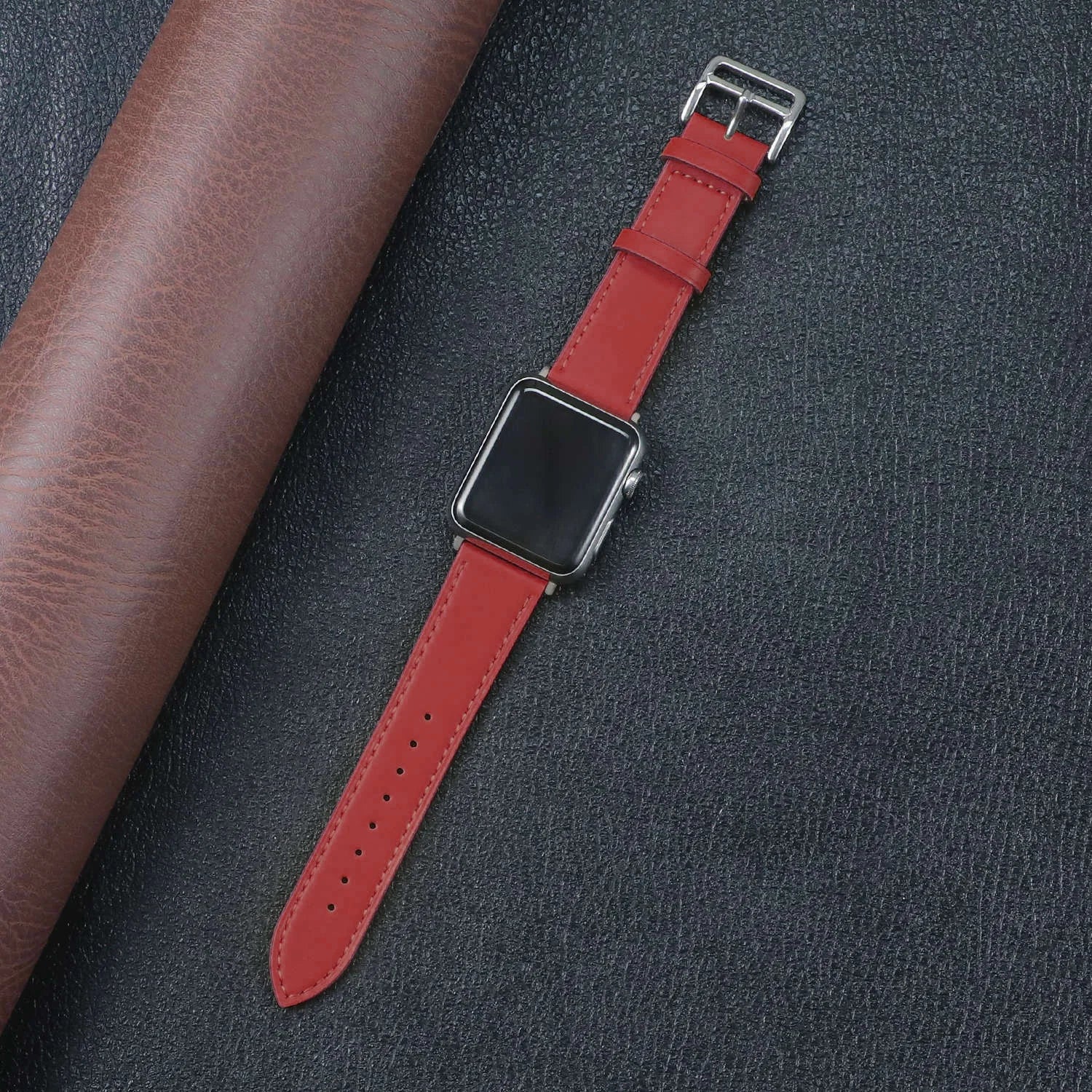 Red Apple Watch Fabric Band on a dark background with leather material, showcasing durability and stylish design.