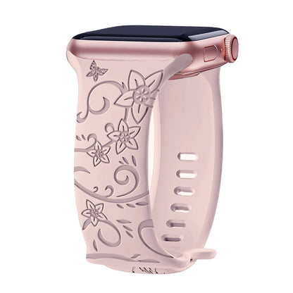 Apple Watch Silicone Strap in soft pink with floral engravings, waterproof and stylish for smartwatch enthusiasts.
