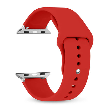 Red silicone strap for Apple Watch, comfortable, waterproof, perfect for workouts and casual wear.