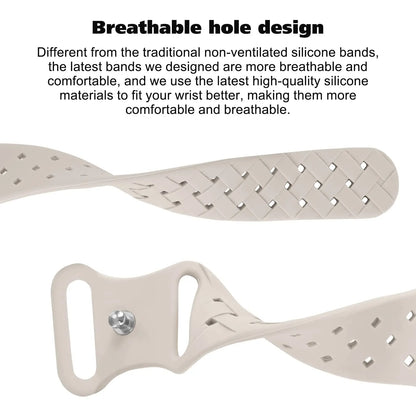 Close-up of Apple Watch silicone strap showcasing breathable hole design for comfort and airflow.