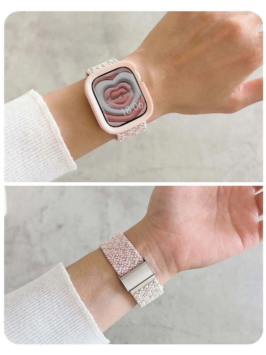 Pink and beige woven Apple Watch band showing case and slider on wrist