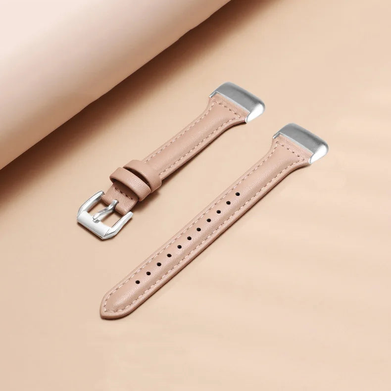 Slim leather strap for Fitbit Charge 5, stylish and comfortable smartwatch band, ideal for everyday wear.