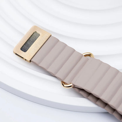 Close-up of a stylish beige silicone smartwatch band with a gold clasp, ideal for Garmin quickfit replacement.