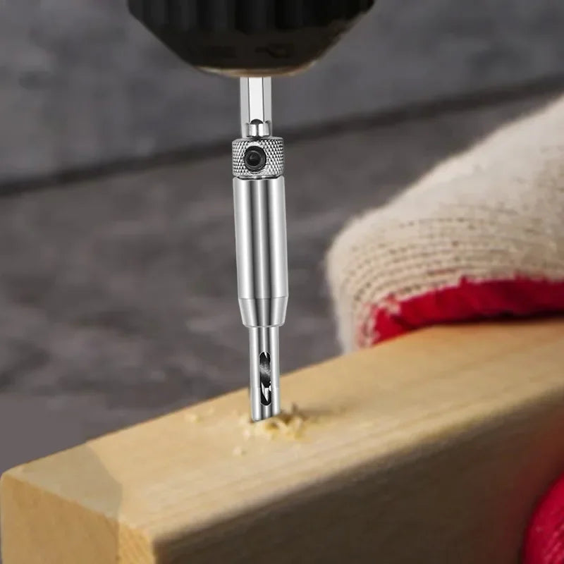 Self-centering hinge drill bit in use on wood