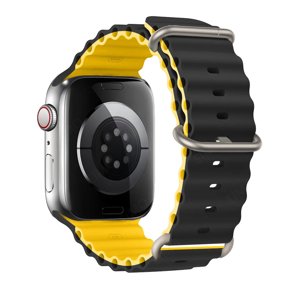 Apple Watch with black and yellow silicone strap, waterproof and breathable for comfort during workouts.