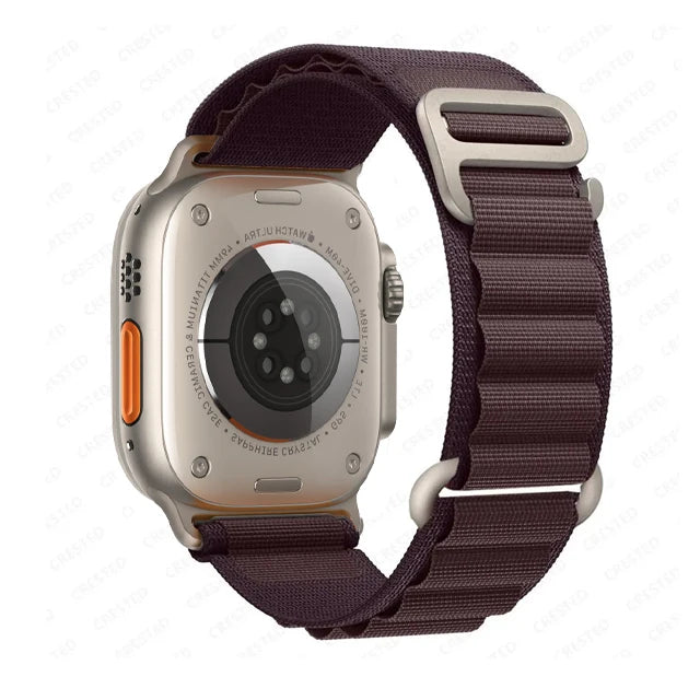 Apple Watch with Rugged Alpine Loop nylon strap showcasing its durable construction and adjustable fit.