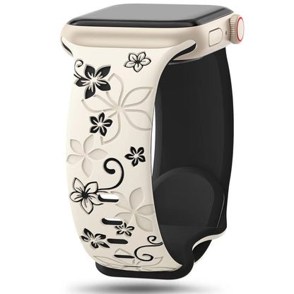 Apple Watch silicone strap in creamy color featuring intricate floral designs for a stylish and comfortable fit.