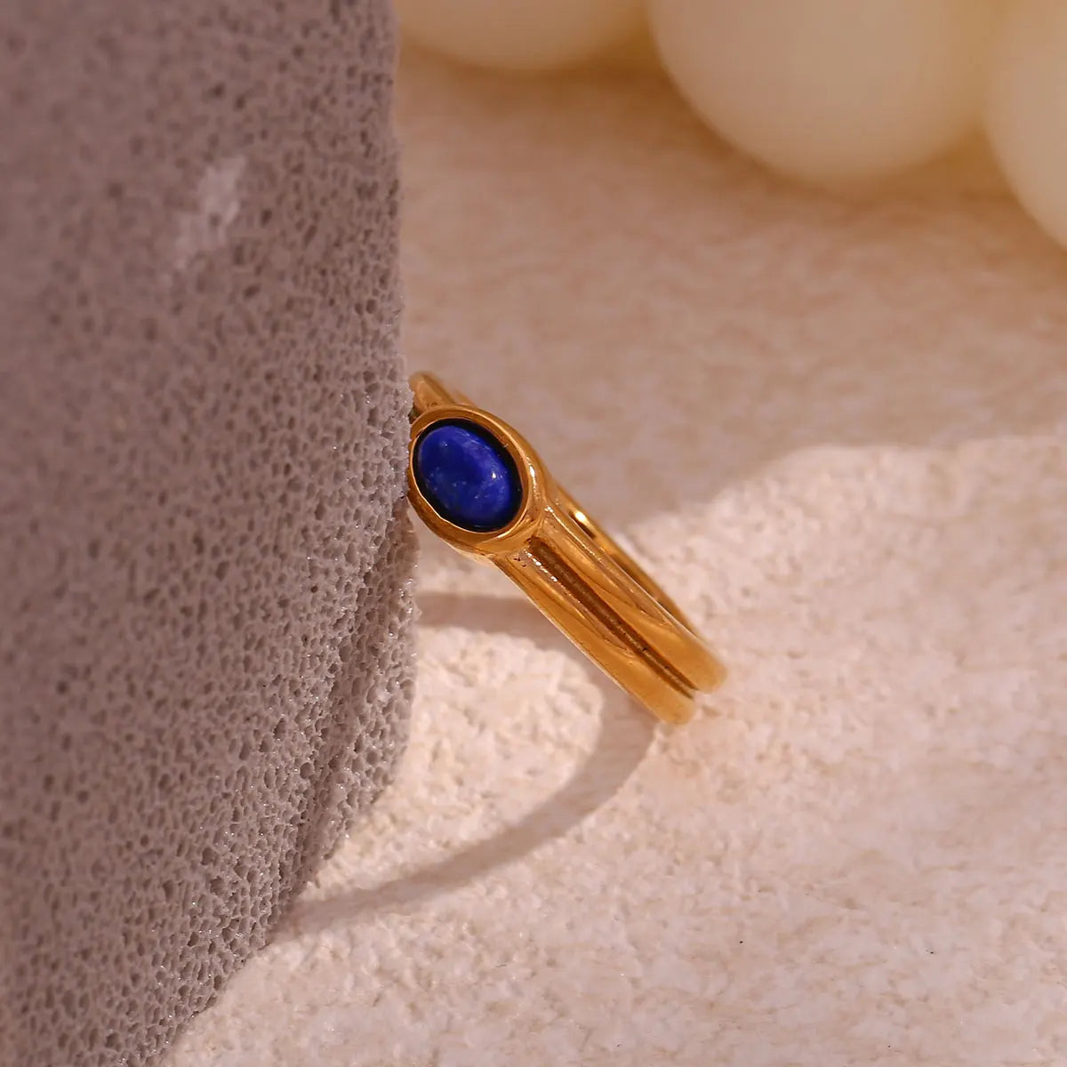 Paved lapis lazuli ring, gold-tone stainless steel