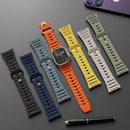 Variety of Apple Watch Sport Silicone Straps in different colors with a smartwatch displayed, highlighting flexibility and style.