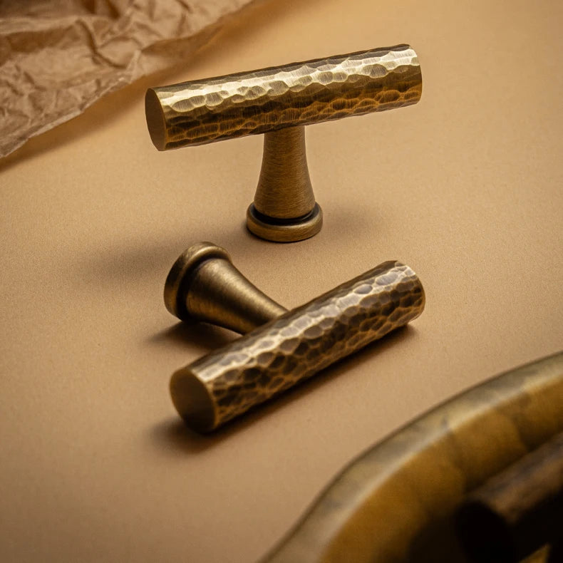 Hand-hammered solid brass T-bar cabinet knob in antique brass