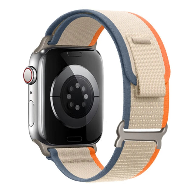 Apple Watch Trail Loop Nylon Strap in beige and orange, durable, lightweight, and adjustable for maximum comfort.