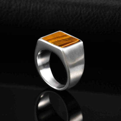Tiger's eye 14mm signet ring, stainless steel, dark background