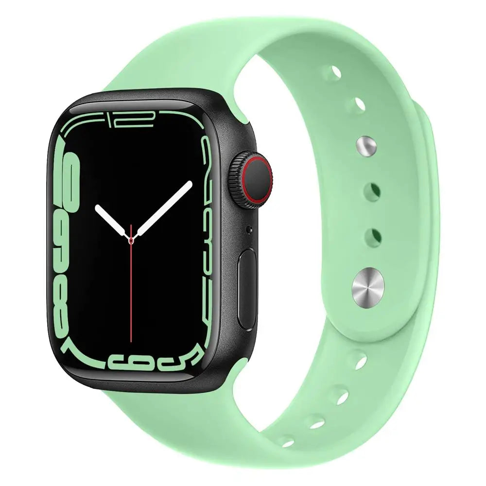 Apple Watch with mint green silicone strap, showcasing its waterproof and comfortable design for daily wear.