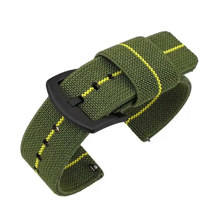Green nylon Suunto watch band with yellow stripes, designed for comfort and minimal bulk. Ideal for everyday wear.