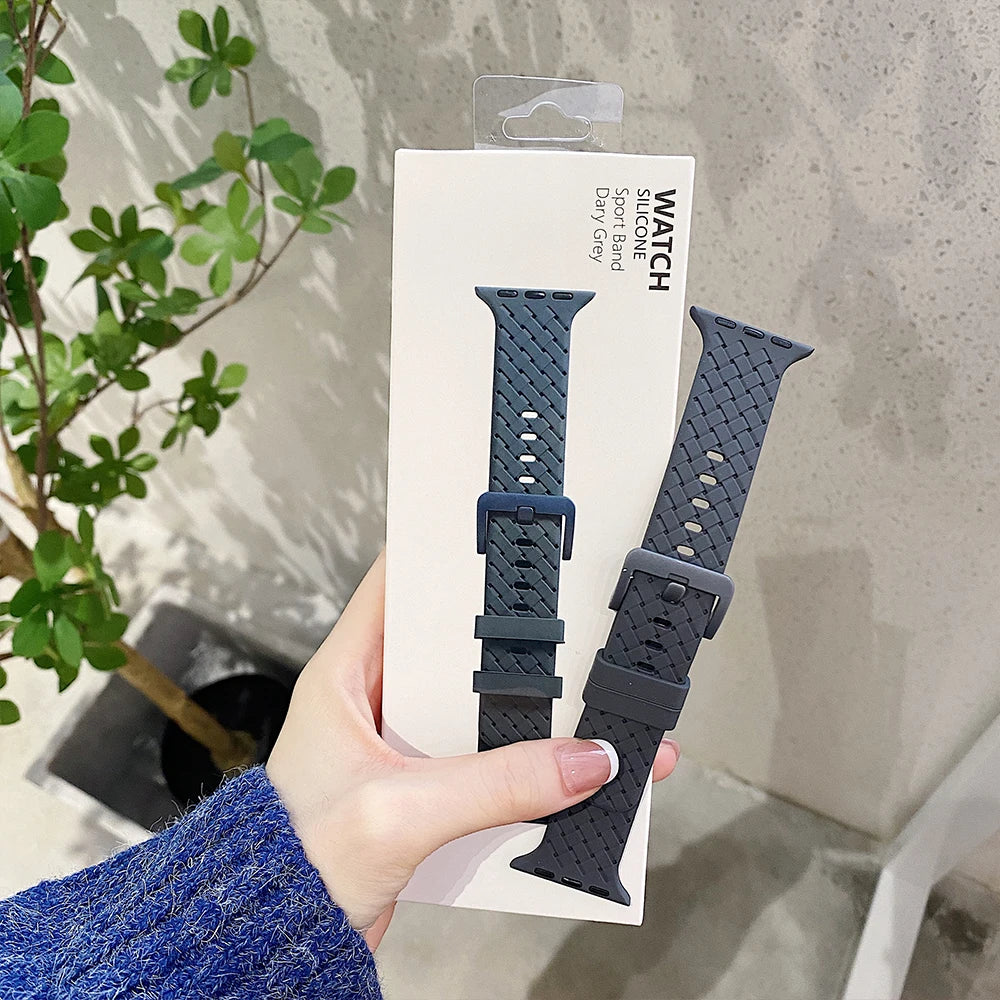 Apple Watch Silicone Strap in packaging, showcasing soft rubber band for comfort and adjustable fit.
