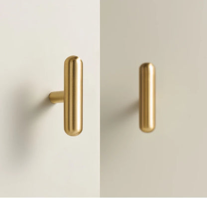 Smooth solid brass cabinet pull in brushed brass