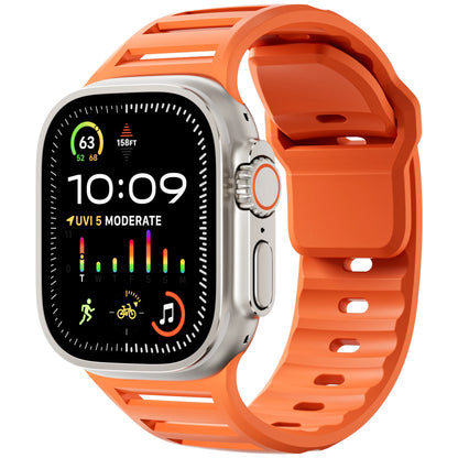Apple Watch Sport with orange silicone strap, designed for comfort, flexibility, and waterproof use during workouts.